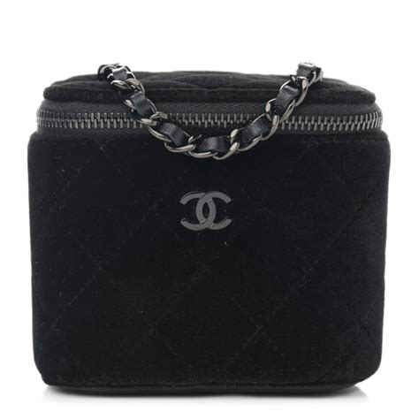 chanel velvet suitcase.